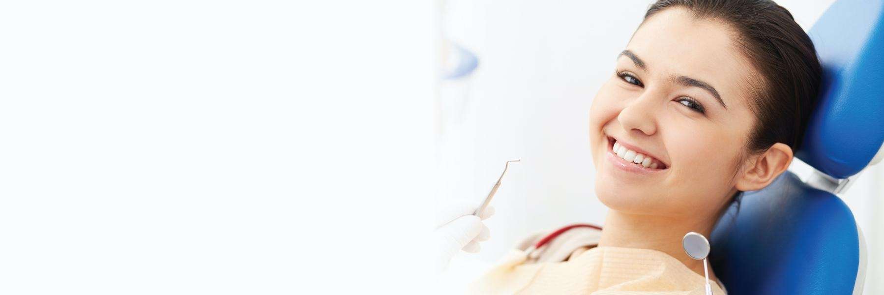 woman smiling in dental chair in appleton