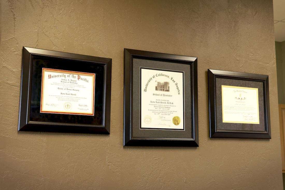 dentists credentials on the wall